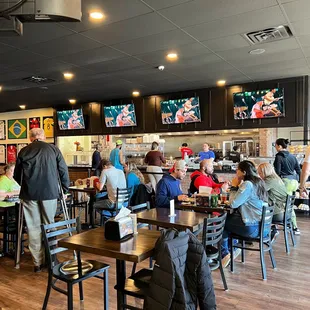 a large group of people eating