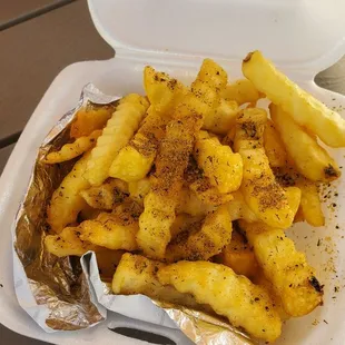 french fries in a styrofoam container
