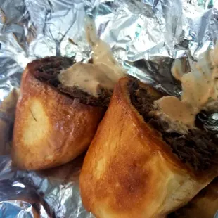 Bolillo with Barbacoa and french roll dug out and filled with your choice of meat and creamy thousand island dressing.
