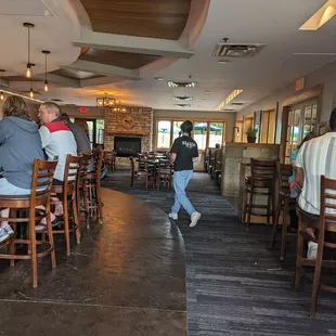 a group of people sitting at tables