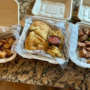 (Left to right) cheese curds, Cuban sandwich, garlic parm boneless wings