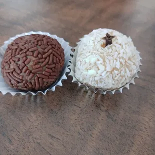 a close up of a cupcake with a chocolate brain on top