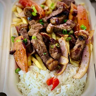 a meal in a styrofoam container