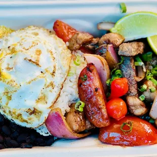 a close up of a meal in a styrofoam container