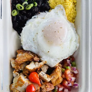 a meal in a styrofoam container