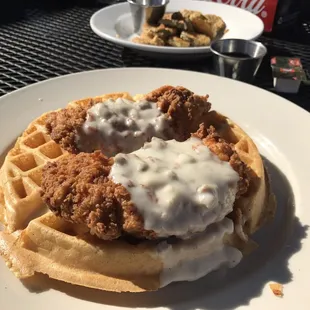 Chicken and waffles (photobomb by fried pickles)