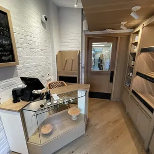 a kitchen with a counter and a chalkboard