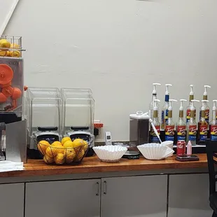 Machine to make fresh squeezed orange juice.