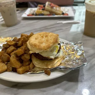 The sausage biscuit breakfast sandwich meal.