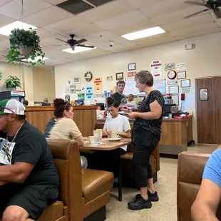 The pass, counter dining, and booths.