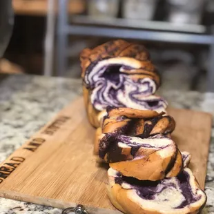 blueberry swirl bread on a cutting board