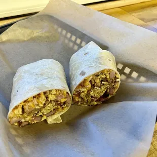 Ham, egg, cheese burrito.  It looks lonely.  Needs a side or to be bigger, but it&apos;s good! Maybe if they add taters inside ...
