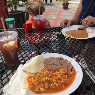 Huevos salsa with beans and tortillas