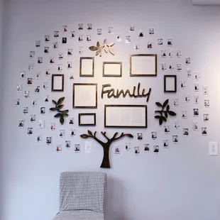 Family wall with all the restaurant regulars and the tree keeps growing :)