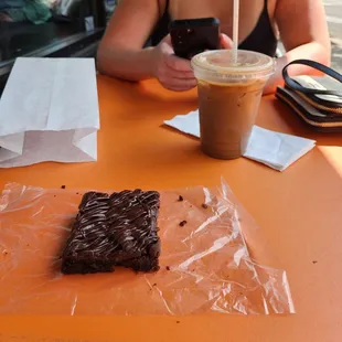 Brownie and iced turtle latte