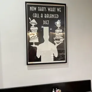 a poster on the wall of a restaurant