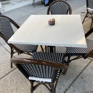 a table and chairs outside
