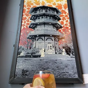 a person holding a drink