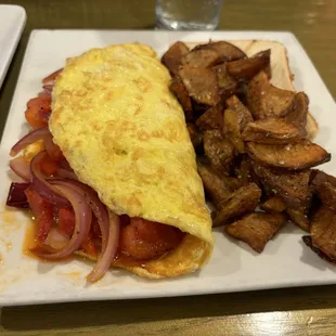 Veggie omelette and home fries