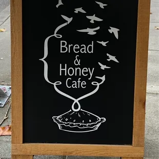 a sign for bread and honey cafe
