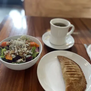Beet and blue cheese salad (delicious), breakfast empanada, and tea.