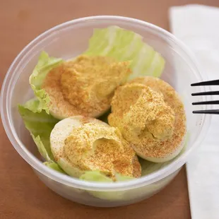 eggs and lettuce in a bowl