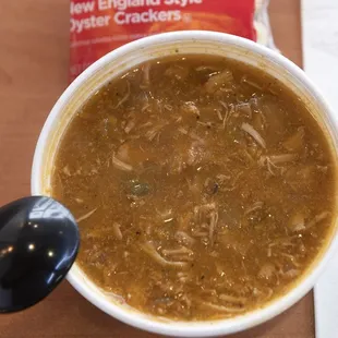 a bowl of soup and a spoon