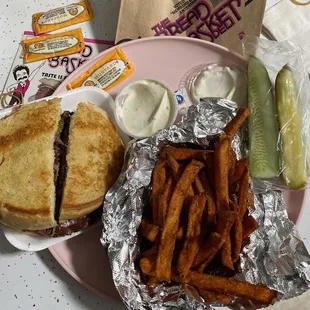 Pastrami sandwich and Sweet Potato Fries