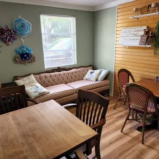 a living room with a couch and a table