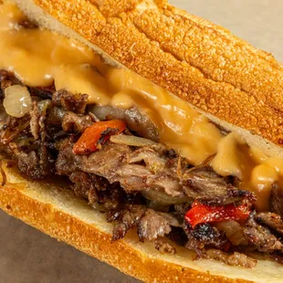 a beef sandwich with cheese