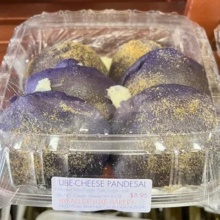 a variety of pastries in plastic containers