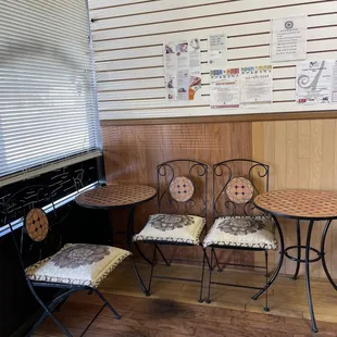 Small cafe tables to sit and enjoy your pastries!