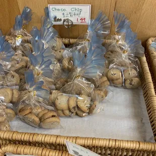 a display of cookies in a wicker basket