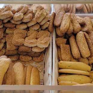 Dipping breads with sesame, coconut, or anise.