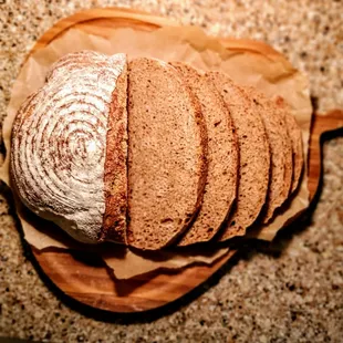 a loaf of bread on a cutting board