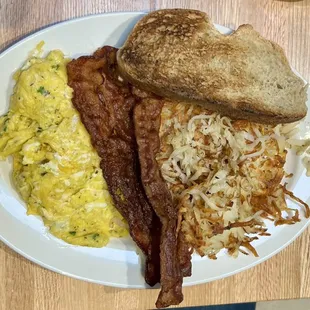 bacon, eggs, hash browns and toast