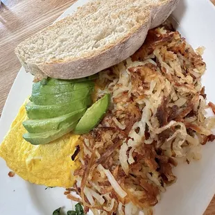 Bacon, Goat Cheese, Avocado and Spinach Omelet with Hash Browns and Rustic Toast