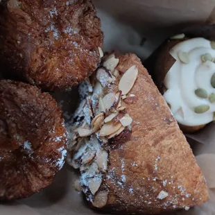 Kouign Amann, almond bostock, Pumpkin cupcake