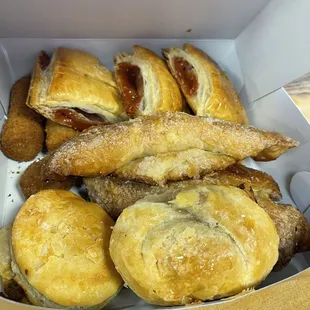 a variety of pastries in a box