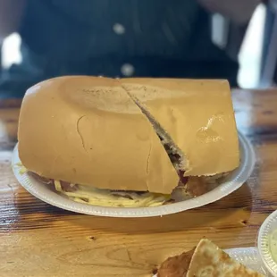 a sandwich and chips on a table