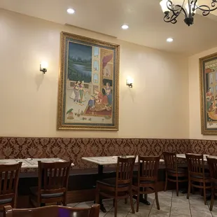 a man sitting at a table in a restaurant