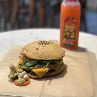 a sandwich with cheese and vegetables