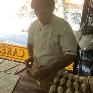 Sean rolling out the croissants--totally from scratch, made by hand.