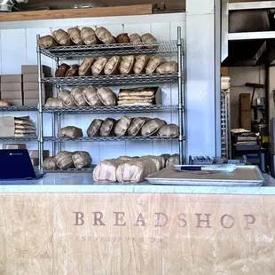 The daily breads wrapped and ready for pick up. They're no longer displayed for walk up purchase.