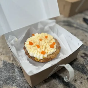 $12.00 Mango mousse mini, smaller than my hand.