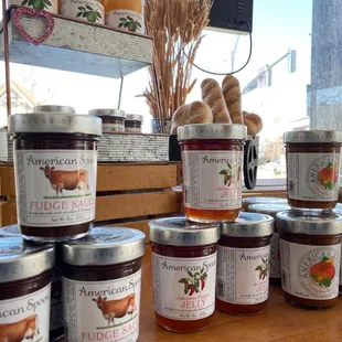 a variety of jams on a table