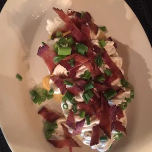 Baked potato with all the fixings. Amazing is an understatement.