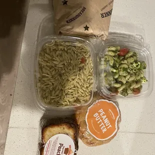 Balsamic Basil Orzo Salad, Pesto Pasta, peanut butter cookie, peach loaf slice (and tilapia wrap still in paper)