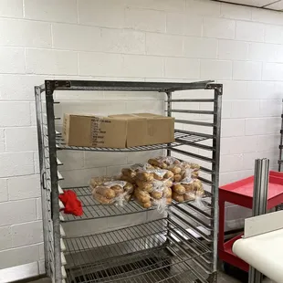 a rack of doughnuts in a bakery