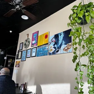 a man sitting at a table in a restaurant